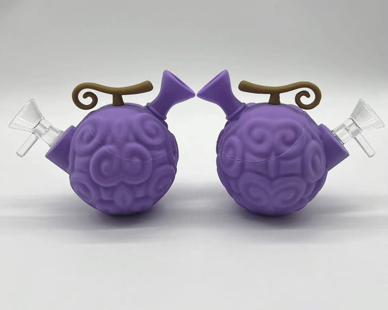 Two purple devil fruit silicone water pipes showing both sides and removable glass bowls